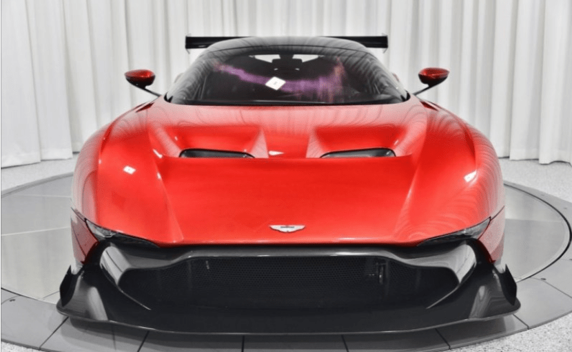 Photo of an Orange Aston Martin Vanquish